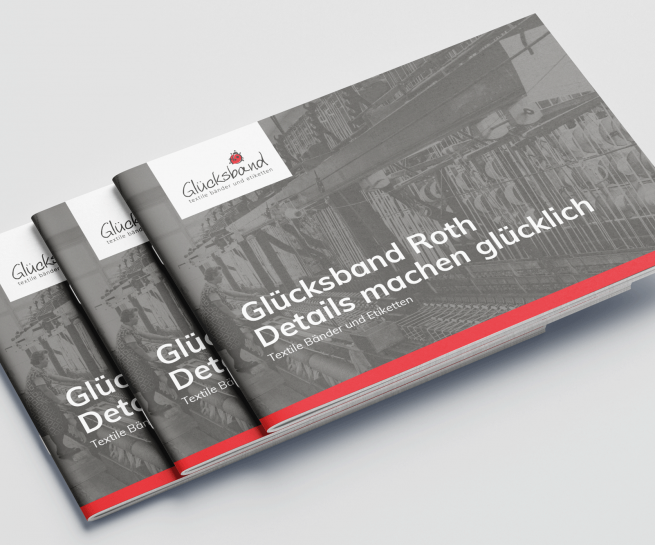 Mockup einer Broschüre der Firma Glücksband